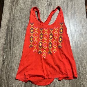 A red, geometric tank top from Arizona Jeans Co.
